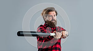 i am dangerous. guy with long beard holding baseball bat. brutal mature hipster