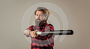 i am dangerous. guy with long beard holding baseball bat. brutal mature hipster