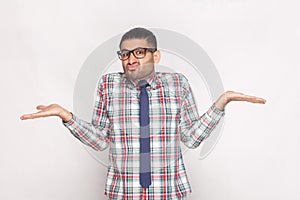 I don`t know. confused bearded businessman in checkered shirt, b