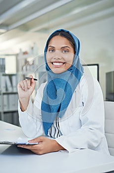 I dont just love science, I live for it. Portrait of a young scientist conducting research in a laboratory.