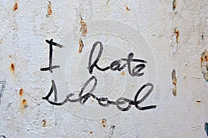 I Hate School graffiti on metal wall
