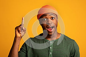 I Have Idea. Inspired Black Guy Raising Finger And Looking At Camera