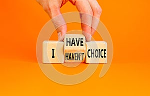 I have or not choice symbol. Concept word I have or have not choice on beautiful wooden cubes. Beautiful orange table orange