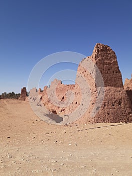 I have a picture of a historical landmark in the desert of Algeria, exactly the Thala Palace