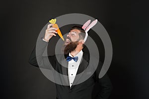 I am hungry bunny. Celebration Easter holiday. Easter day. Event host. Celebrate Easter. Bearded man with long ears