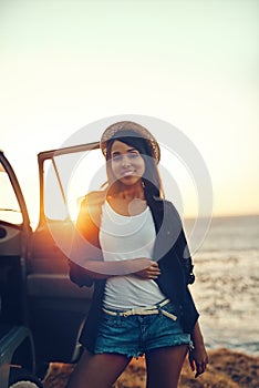 I just love a good road trip. a young woman enjoying a relaxing roadtrip.