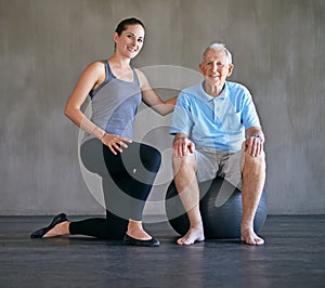 I keep my patients feeling young and spritely. a a physical therapist working with a senior man.
