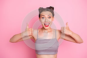 I like it. Photo of amazing youngster lady funny buns raising thumb fingers up expressing full agreement wear casual