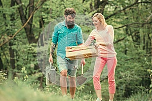 I like spending time on farm. Earth day. Eco living. Couple in the farm on countryside background. Become organic farmer