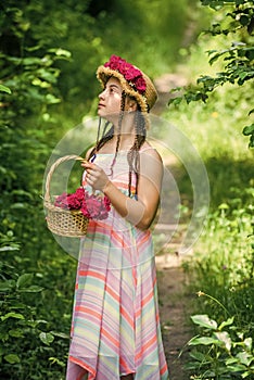 I like taking care of the flowers. small kid with flowers. love and beauty. stunning girl with bouquet flowers of roses