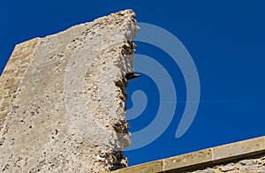 A piece of a old stone wall