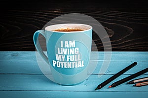 I am living my full potential. Blue coffee mug