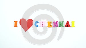 I love Chennai. Text from colorful wooden letters and a beating paper red heart.