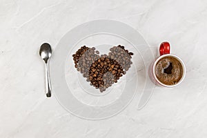 I love coffee with coffee beans in heart shape with cup of coffee