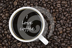 I love coffee. text in coffee cup