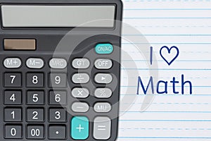 I love math with lined school paper with a calculator