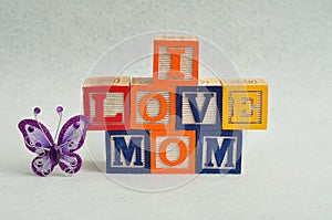 I love mom spelled with colorful alphabet blocks