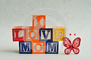 I love mom spelled with colorful alphabet blocks