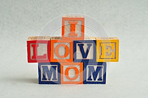 I love mom spelled with colorful alphabet blocks