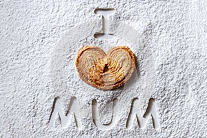 I love mum and Cookie heart on a white flour background