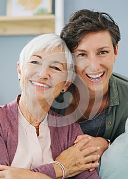 I love my mother. Cropped portrait of an attractive young woman hugging her happy senior mother while at home.