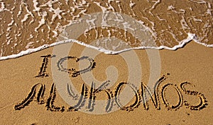 I love Mykonos - the inscription on the sand