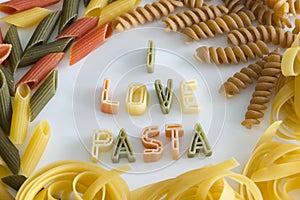 I love pasta text on white plate with colourful pasta letters