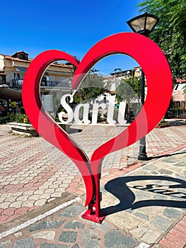 The I love Sarti sign in the city centre of Sarti