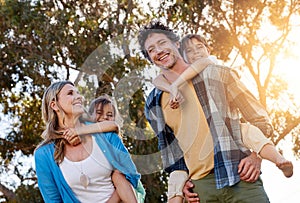 I love them more than words could explain. Portrait of a happy family spending time together outdoors.