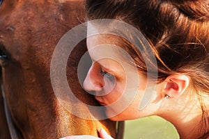 Girl Kissing Horse