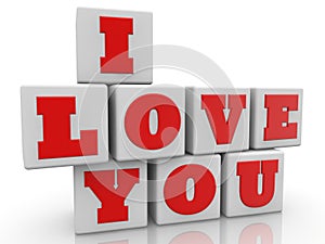 I love you concept on white toy blocks stacked on top of each other