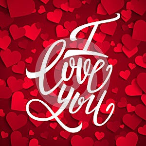 I love you handwritten brush pen lettering on red hearts background, Valentine's Day
