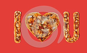 I love you minimal concept sign. Artisan pizza made in the shape of a short text against red background. Flat lay arrangement