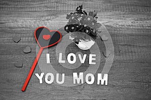 I love you mom wording on old wood mother`s day concept.