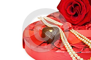 I love you - red rose and pearls over white