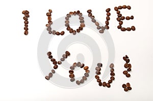 I love you sign with coffee beans over white background