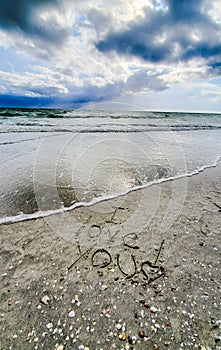 I love you written in sand