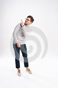 I`m afraid. Fright. Scared man. Business man standing isolated on white studio background. Human emotions, facial