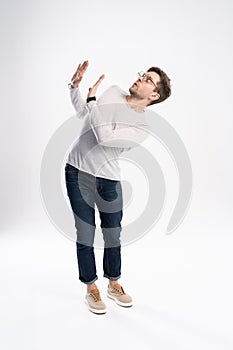 I`m afraid. Fright. Scared man. Business man standing isolated on white studio background. Human emotions, facial