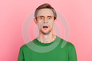 I'm afraid. Portrait of scared man isolated on pink studio background. Human emotions facial expression