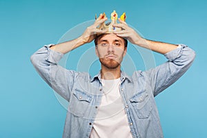 I`m ceo! Portrait of worker man wearing golden crown, imagining promotion at work to position of top manager