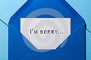 I`m SORRY - message in blue envelope photo