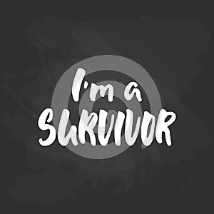 I`m a survivor - hand drawn October Breast Cancer Awareness Month lettering phrase on black chalkboard background. Brush