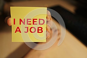 I need a job, on a yellow note paper - Business Concept