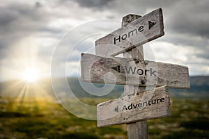 Home, work, adventure signpost.