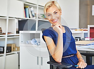 I never miss a deadline. Cropped portrait of a young businesswoman sitting in her office.