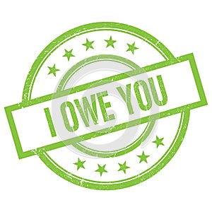 I OWE YOU text written on green vintage stamp