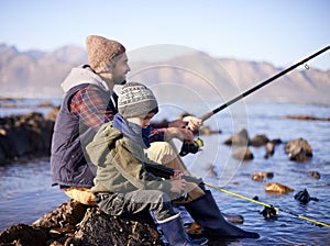 I saw something move...a loving father and son fishing by the sea.