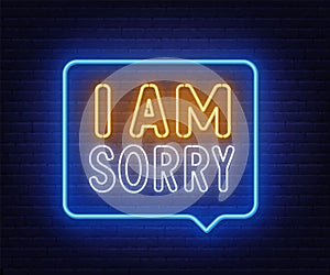 I am sorry neon sign in the speech bubble on brick wall background.