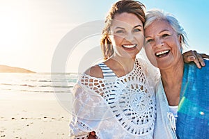 I still enjoy time with my mom. Cropped portrait of a senior woman and her adult daughter spending a day at the beach.